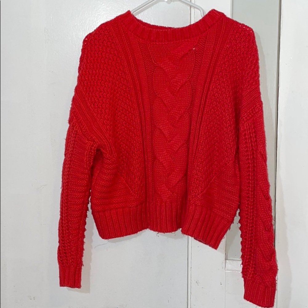 Red cable knit sweater